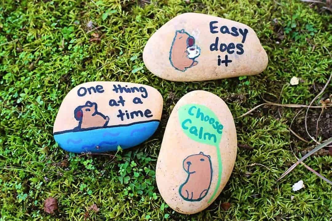 Free Capybara Coloring Pages That Inspire Calm, Cozy Living 6 capybara painted rocks lying in moss